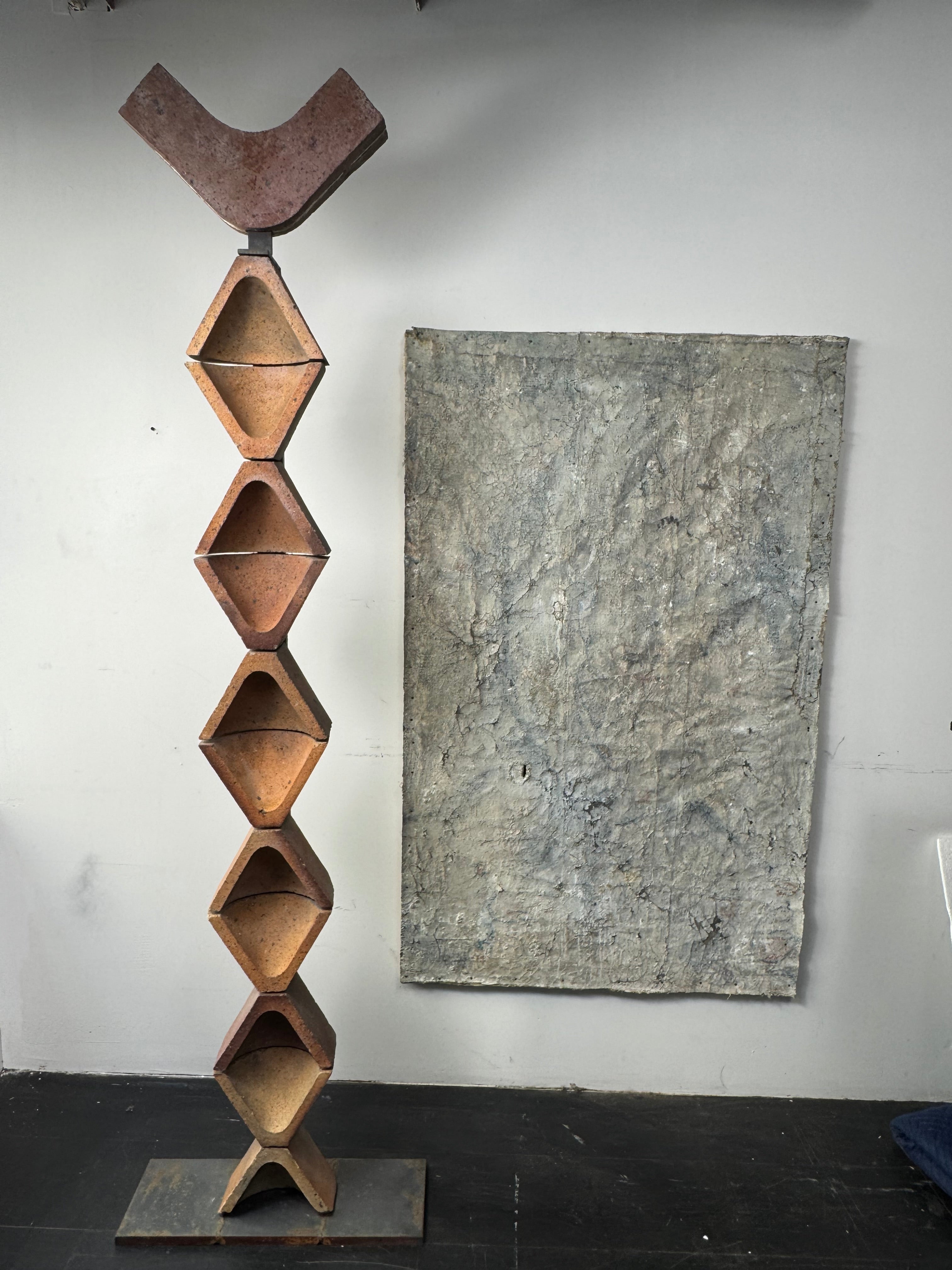 Pair 1970's Vintage Clay & Iron French Totems