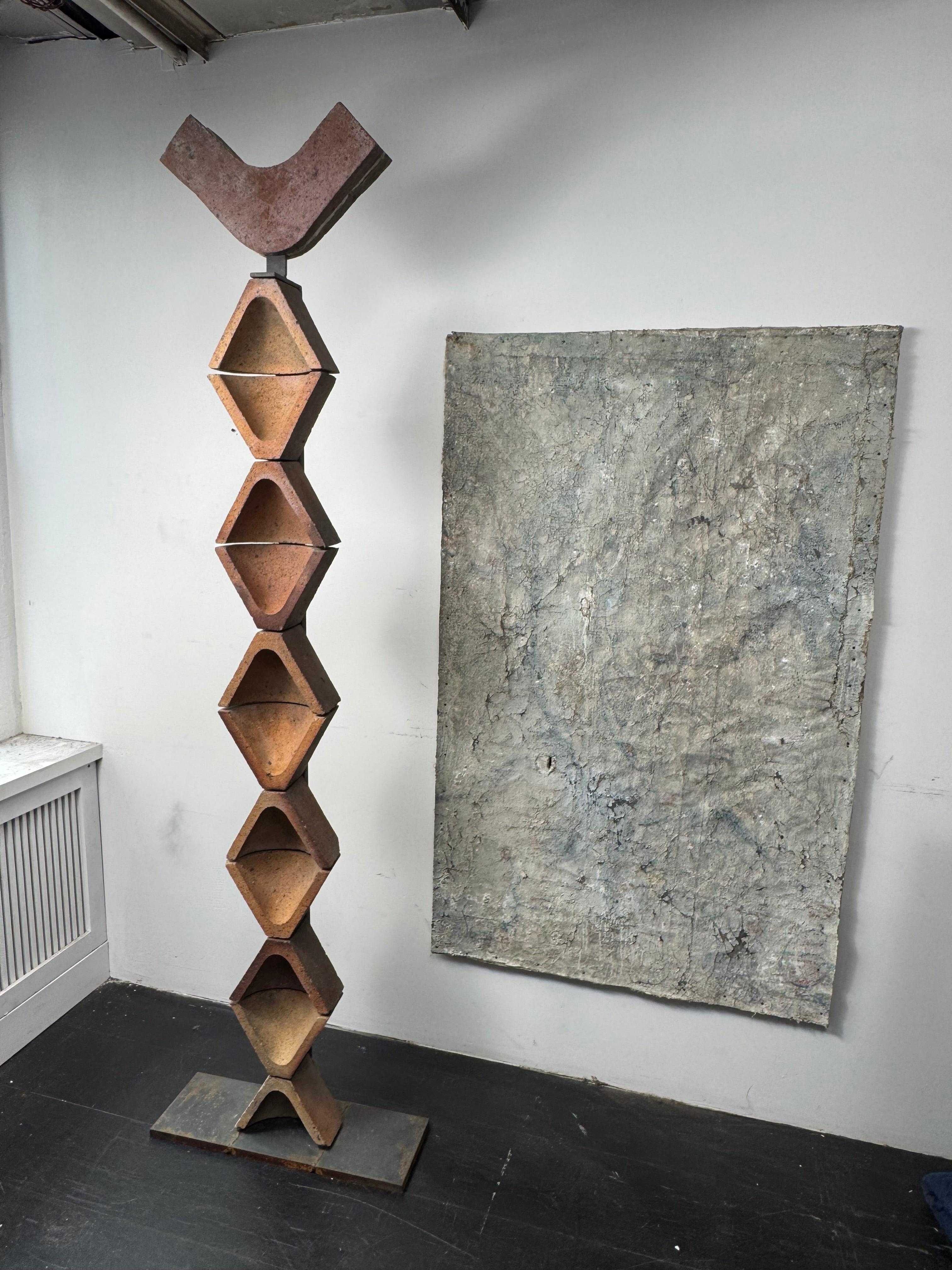 Pair 1970's Vintage Clay & Iron French Totems