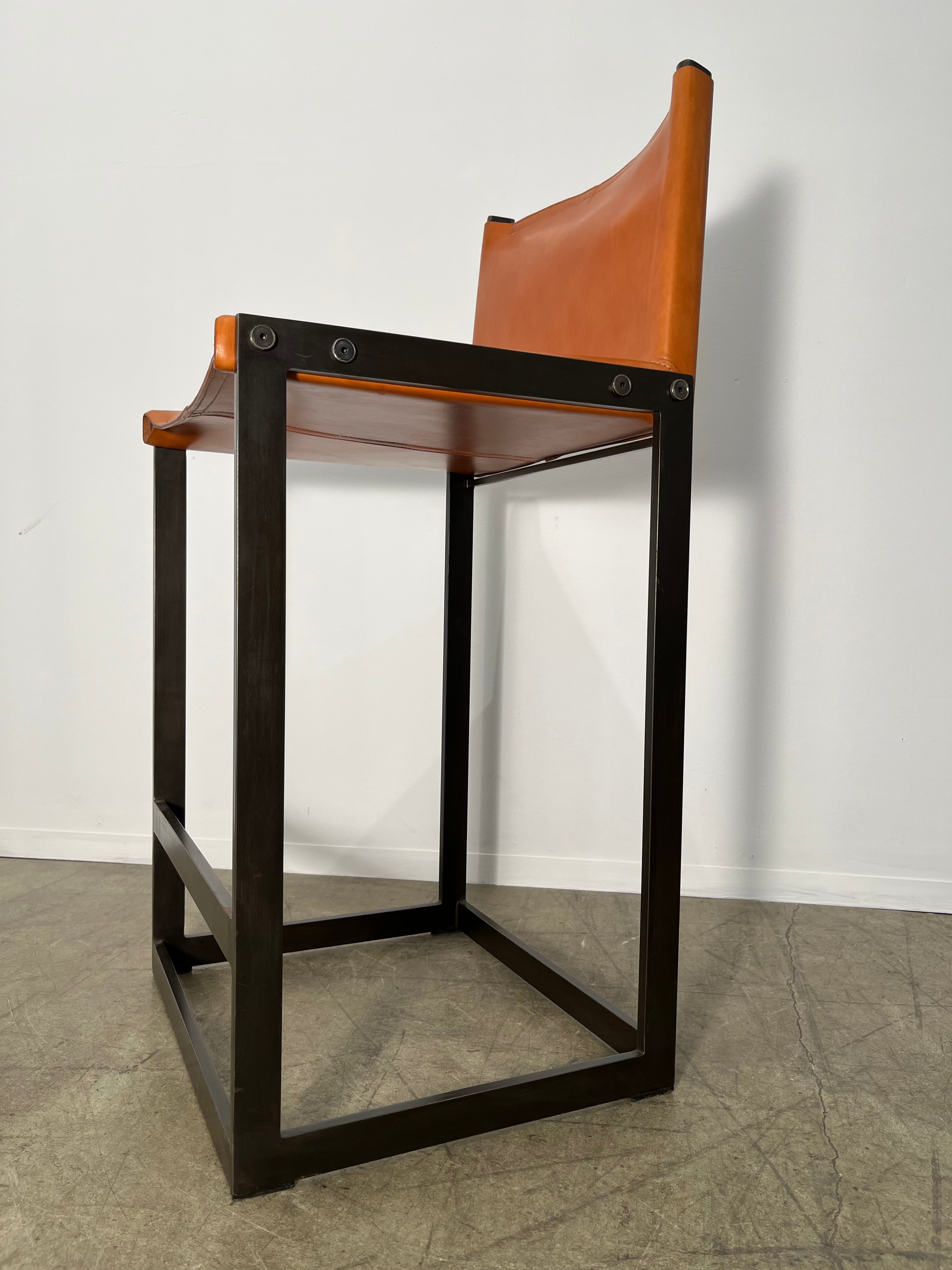 Pair of Limited Edition Saddle Leather Bar Stools