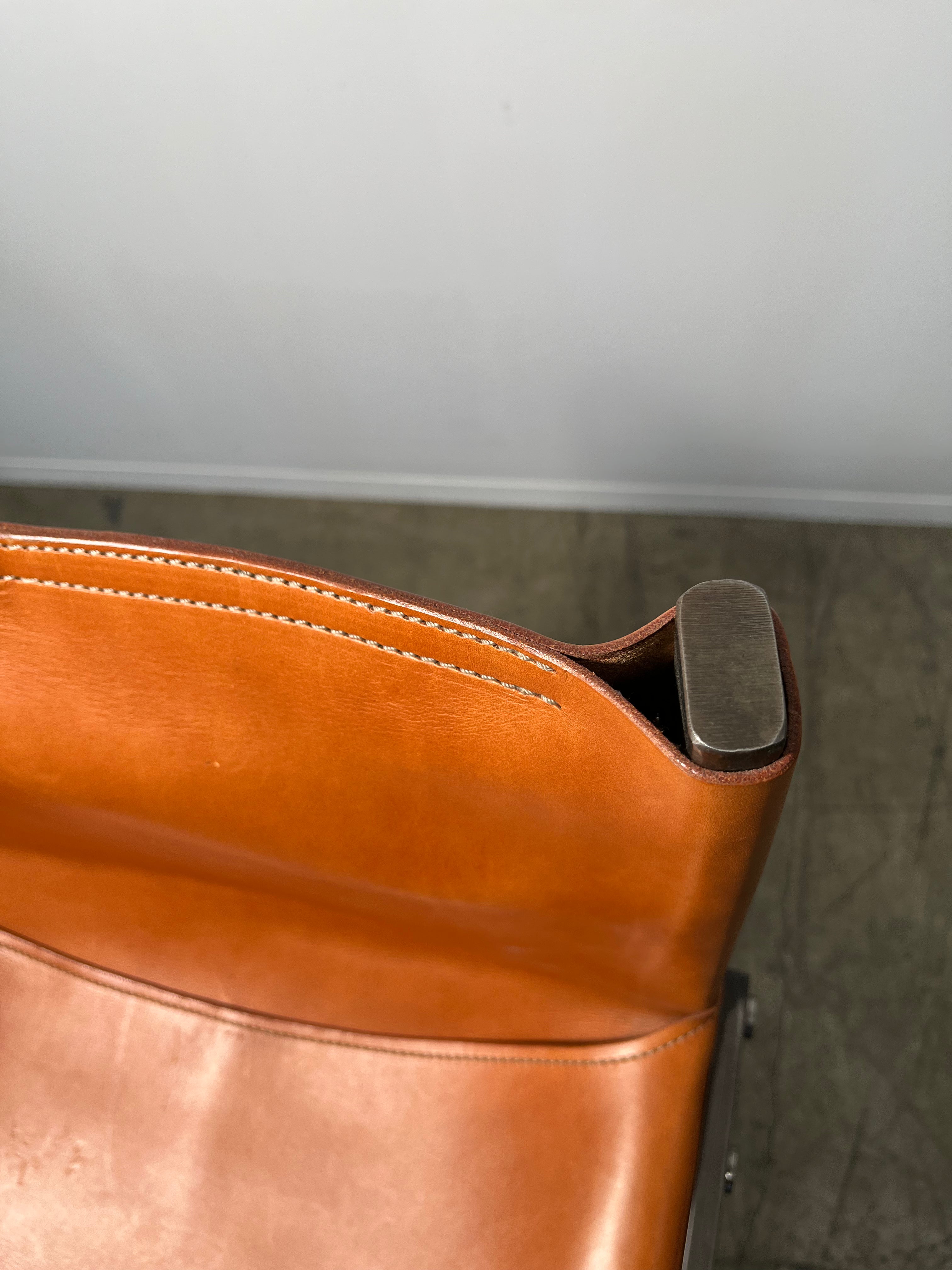 Pair of Limited Edition Saddle Leather Bar Stools