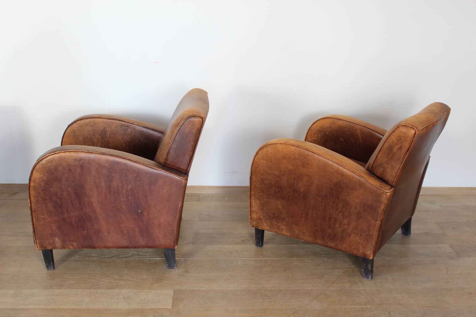 Pair of French 1940's Leather Arm Chairs