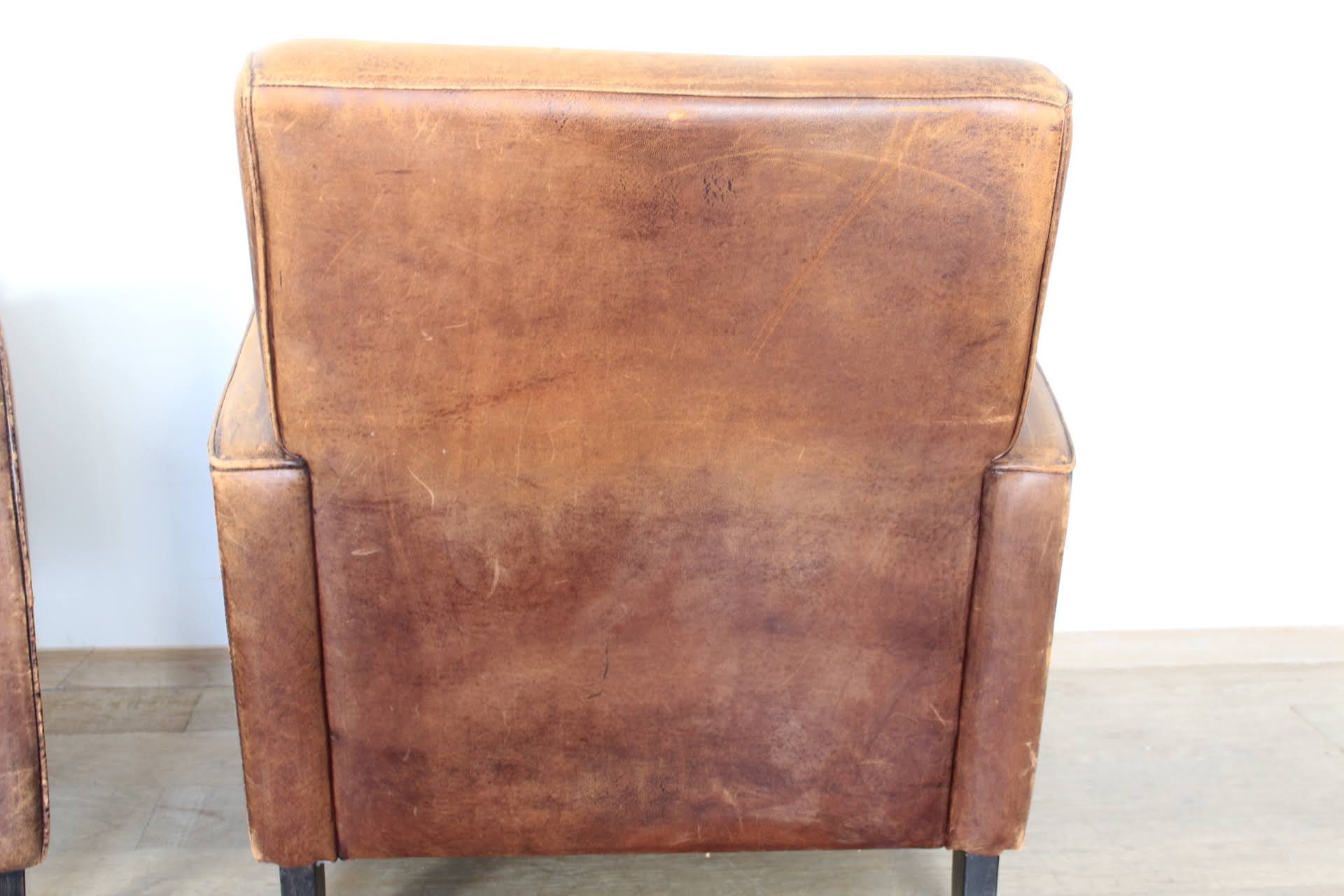 Pair of French 1940's Leather Arm Chairs