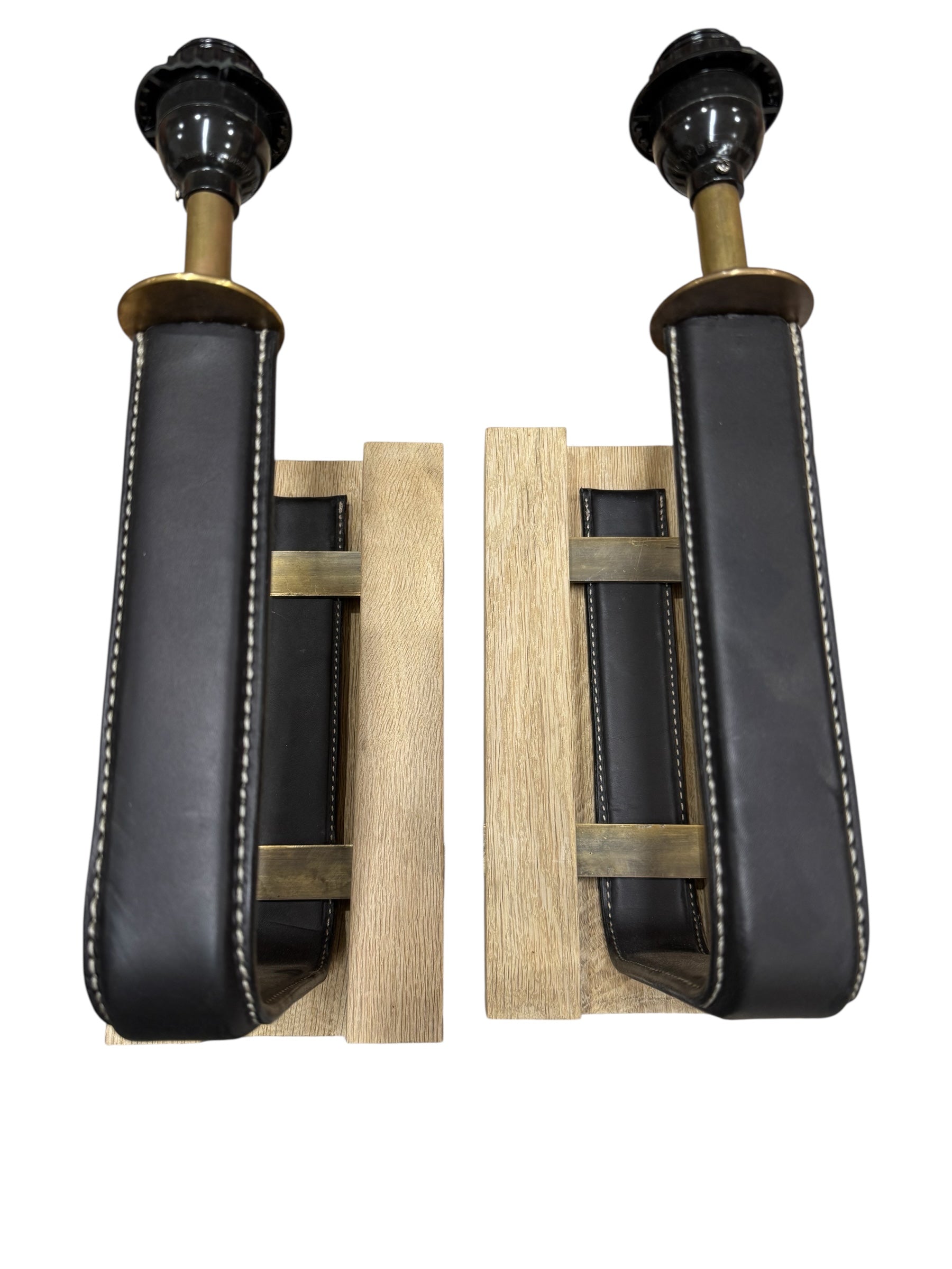 Pair limited edition, Oak, bronze and black leather sconces