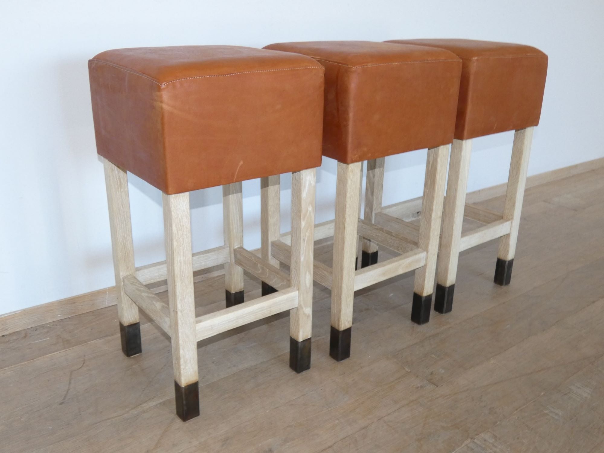 Lucca Studio Set of (3) Percy Saddle
Leather and Oak Stools