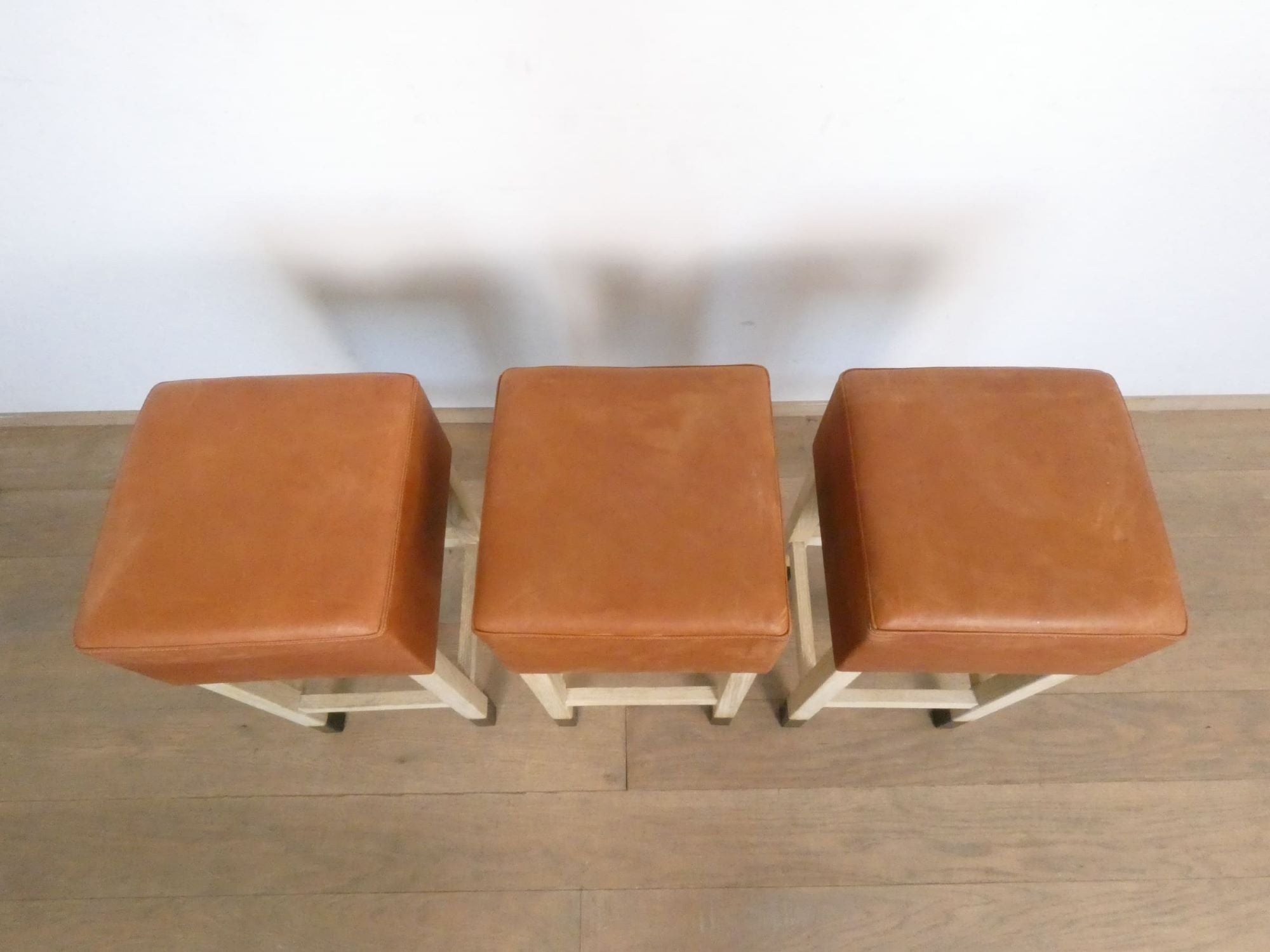 Lucca Studio Set of (3) Percy Saddle
Leather and Oak Stools