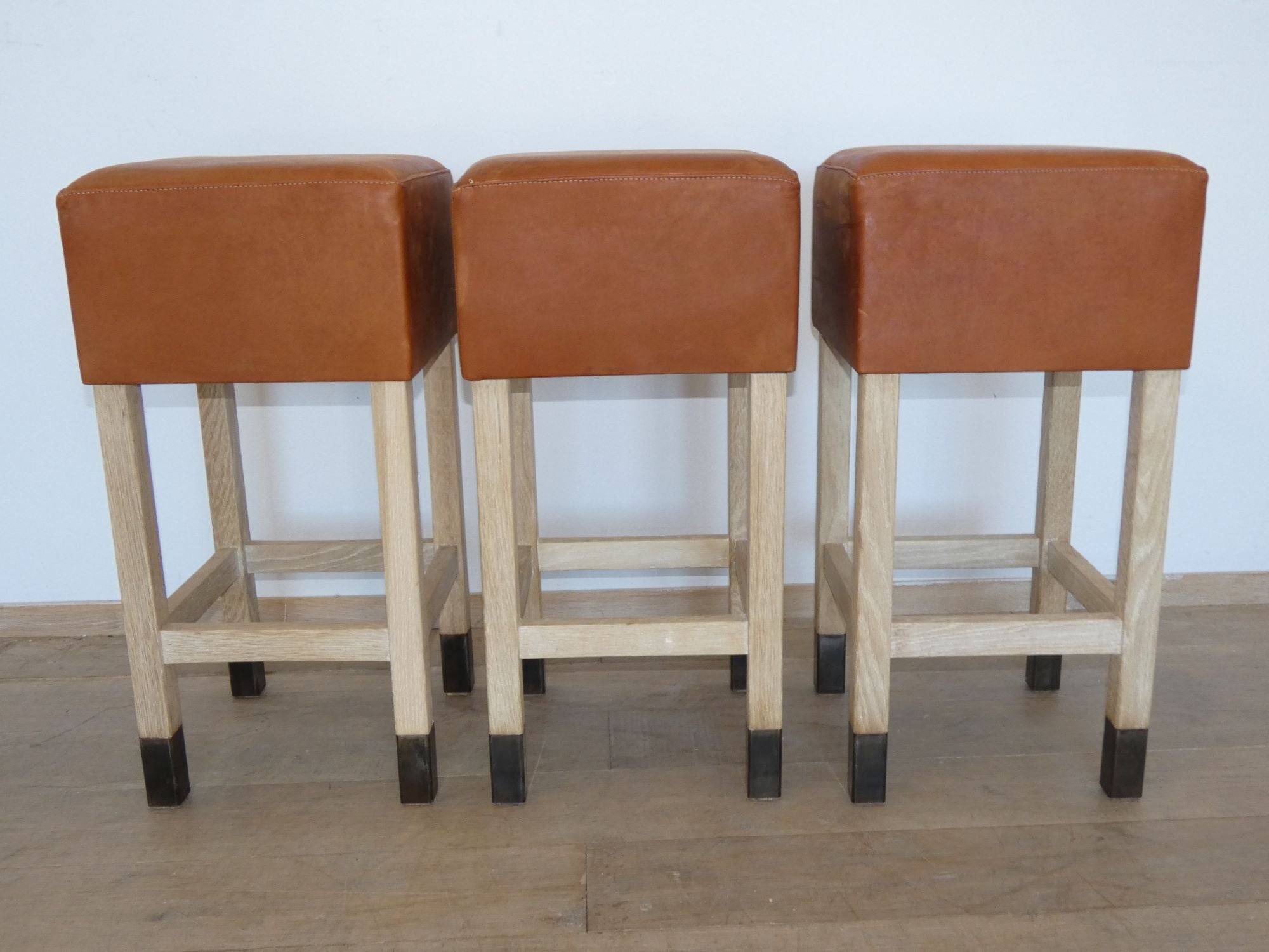 Lucca Studio Set of (3) Percy Saddle
Leather and Oak Stools