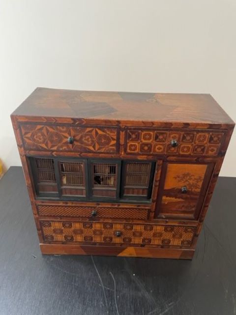 Fine Japanese Tansu with various wood inlays.