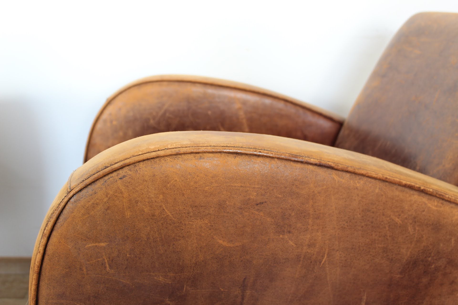 Pair of French 1940's Leather Arm Chairs