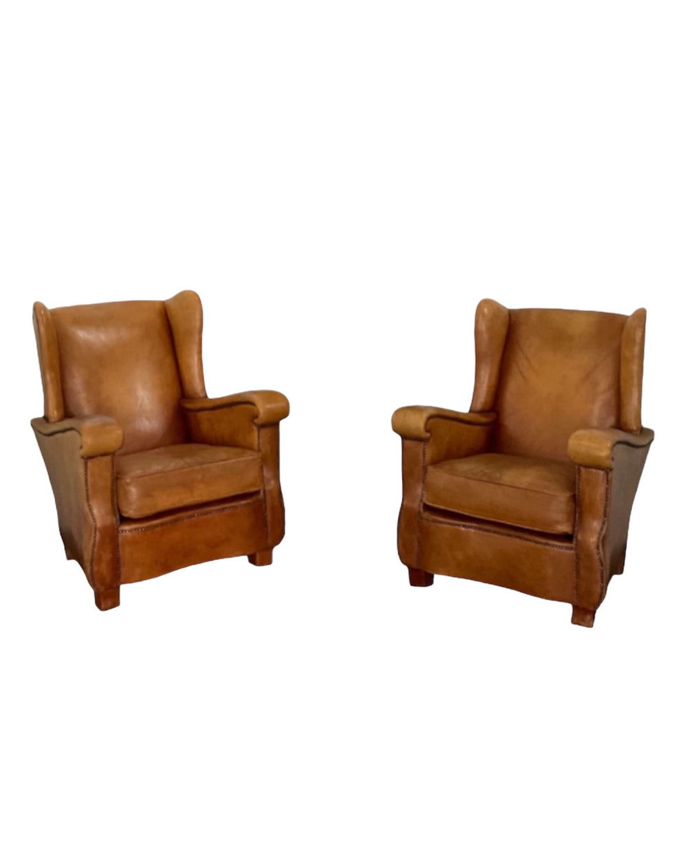 Pair of French Leather Arm Chairs