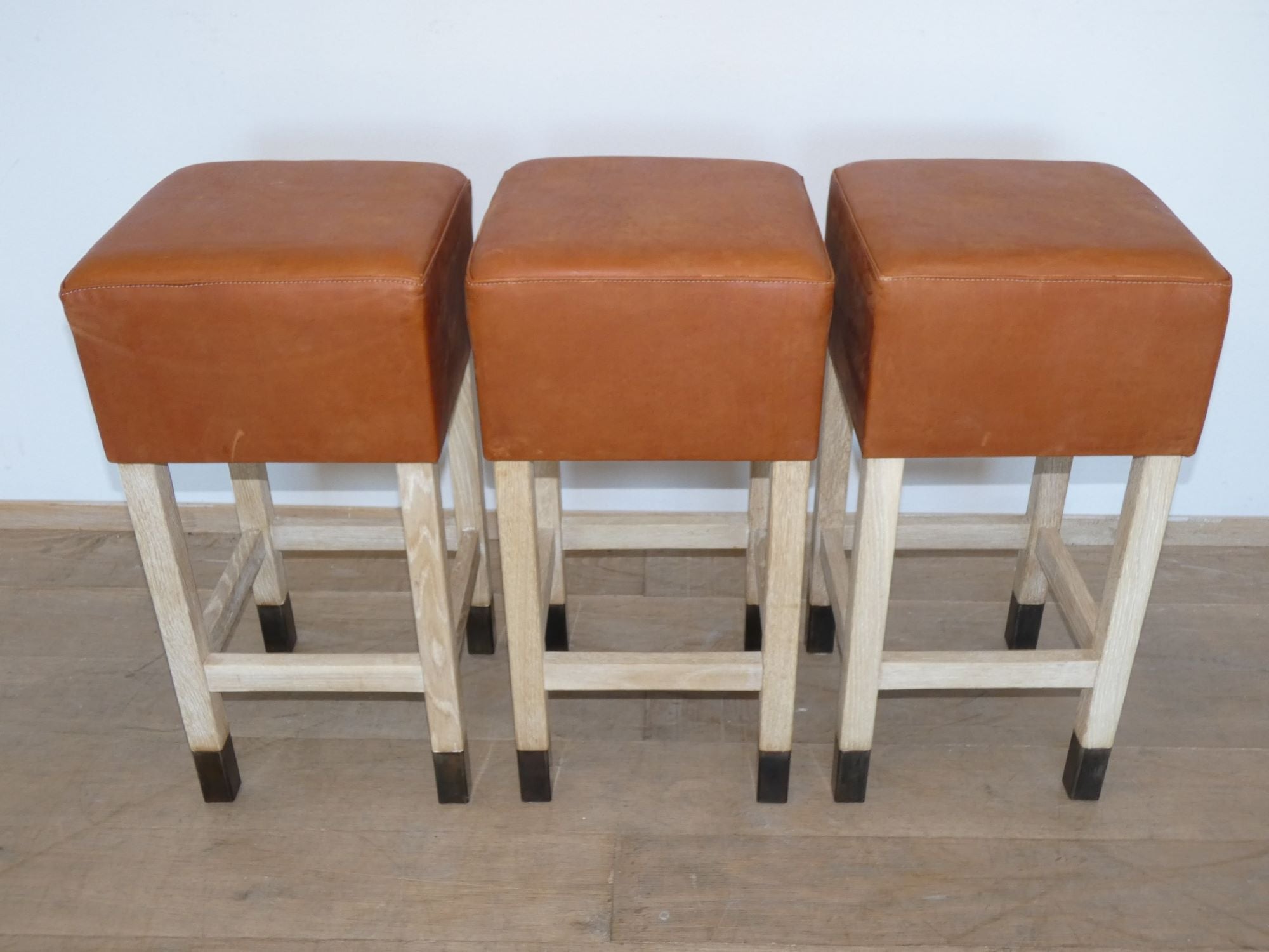 Lucca Studio Set of (3) Percy Saddle
Leather and Oak Stools