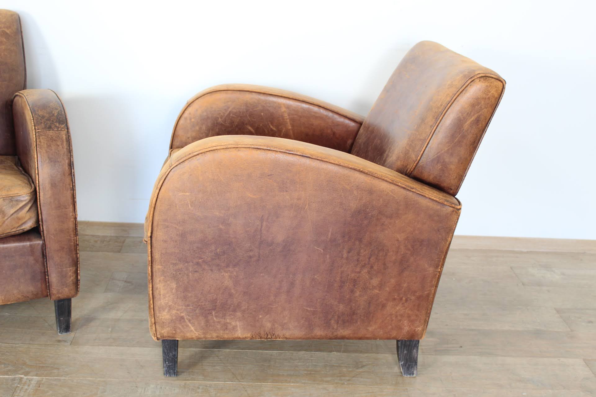 Pair of French 1940's Leather Arm Chairs