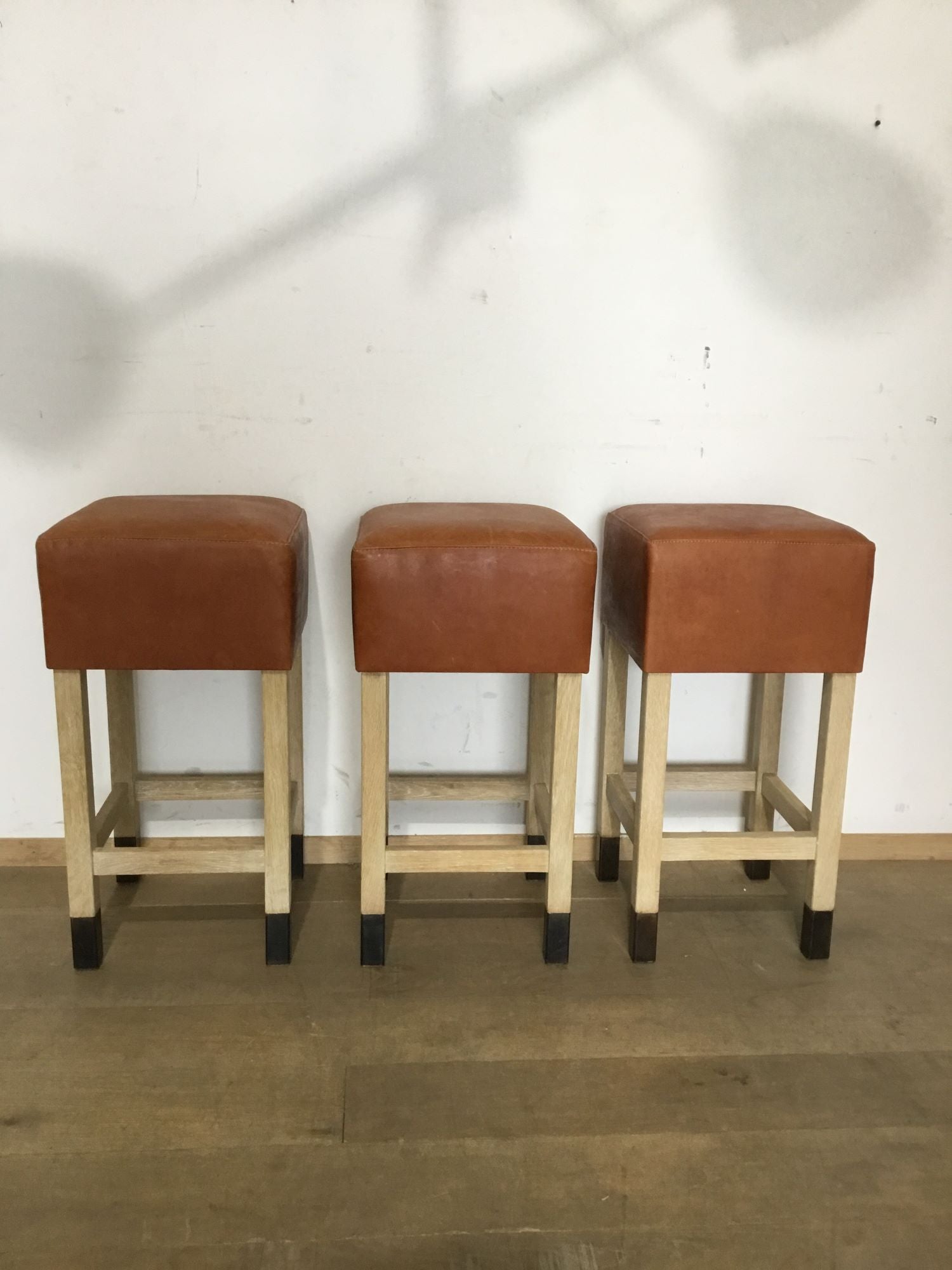 Lucca Studio Set of (3) Percy Saddle
Leather and Oak Stools