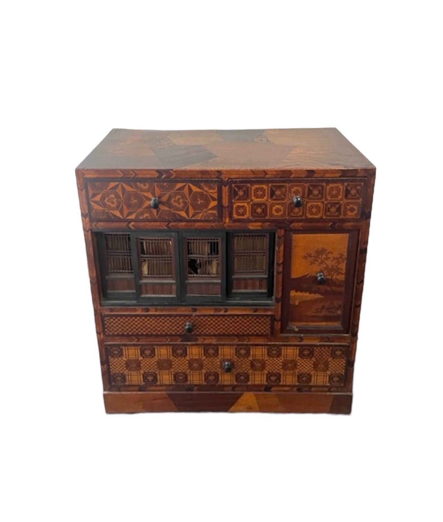 Fine Japanese Tansu with various wood inlays.