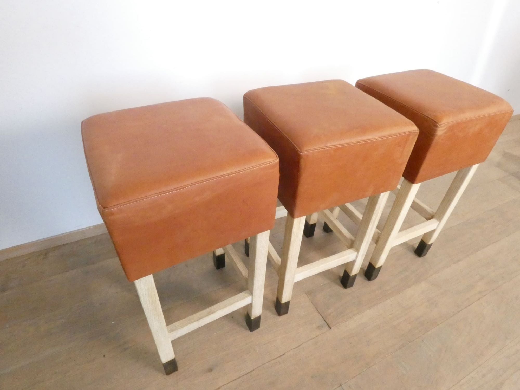 Lucca Studio Set of (3) Percy Saddle
Leather and Oak Stools