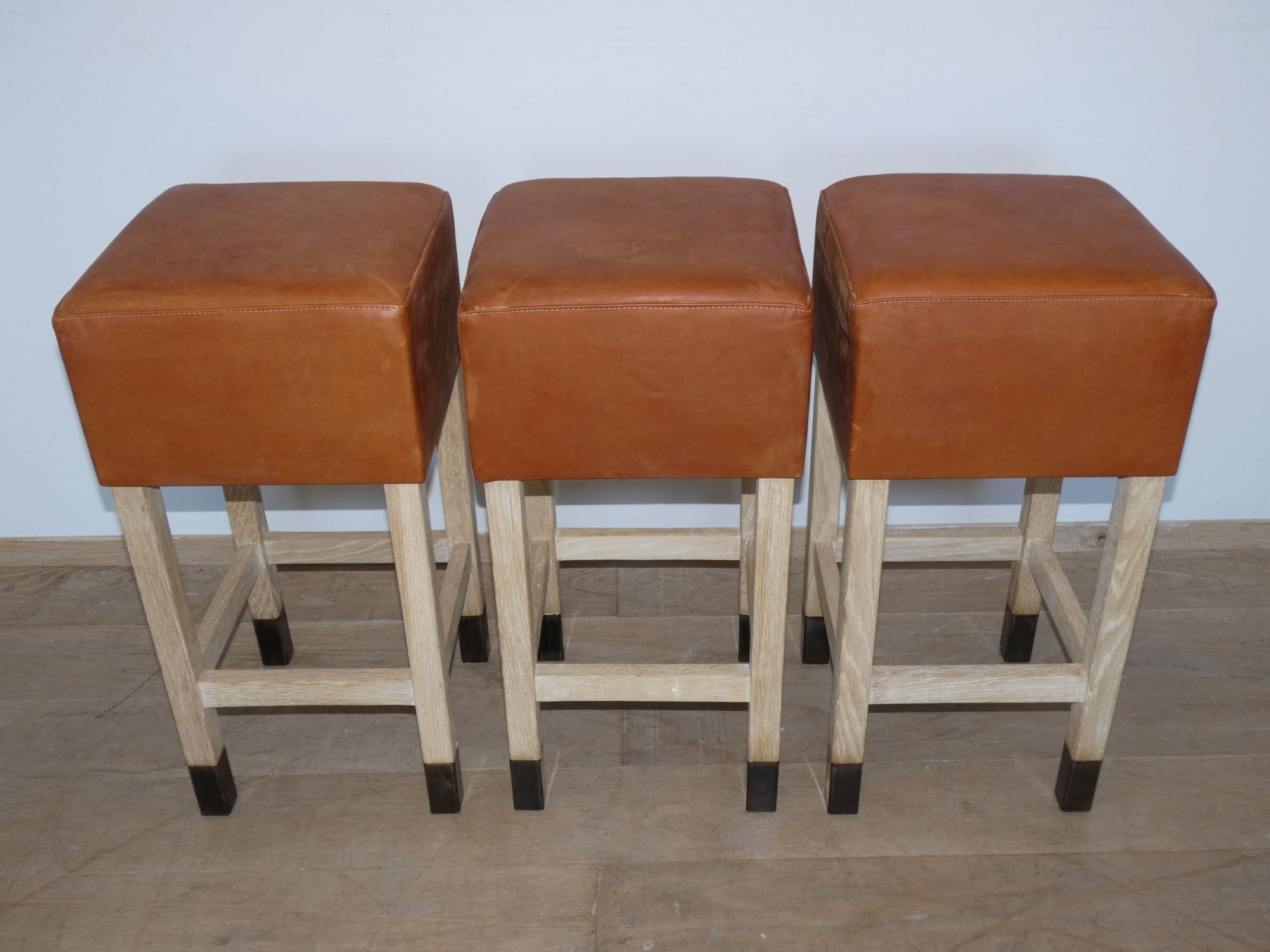 Lucca Studio Set of (3) Percy Saddle
Leather and Oak Stools