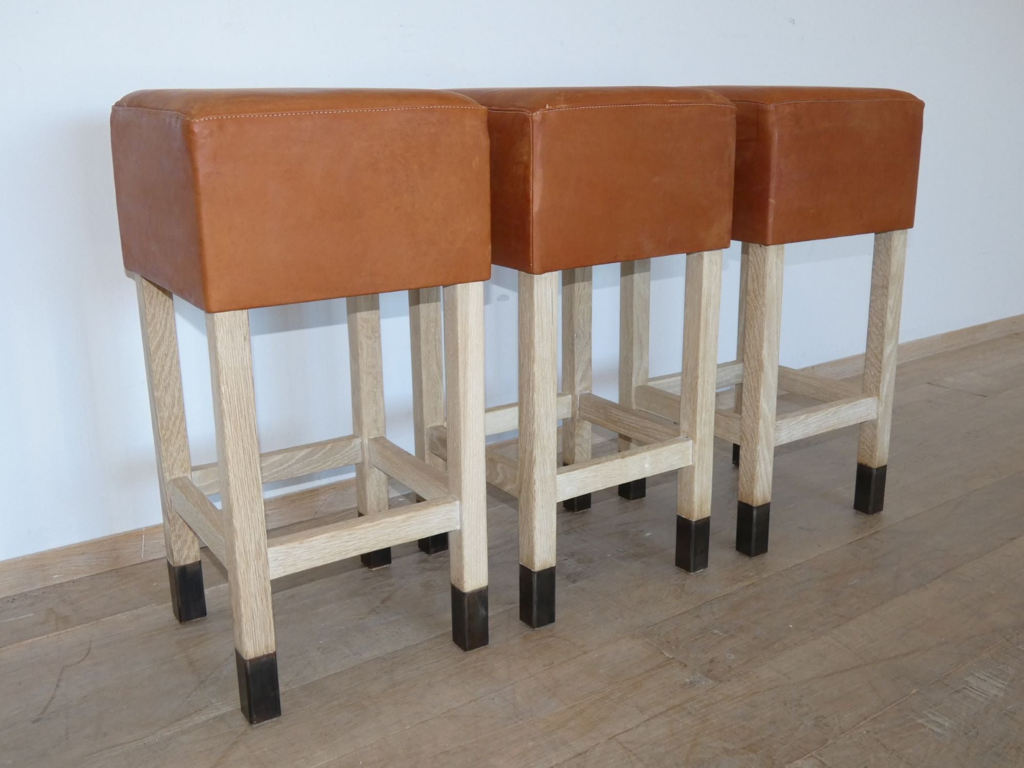 Lucca Studio Set of (3) Percy Saddle
Leather and Oak Stools