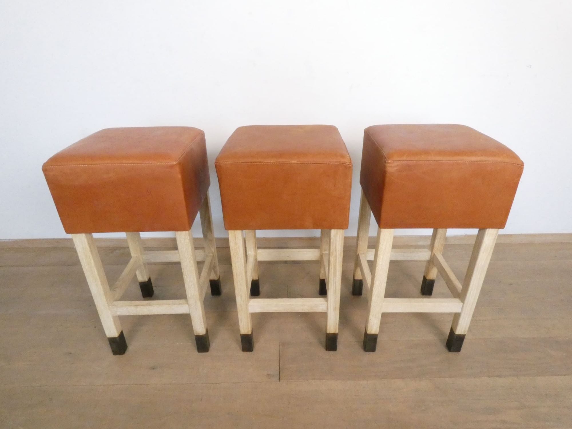 Lucca Studio Set of (3) Percy Saddle
Leather and Oak Stools