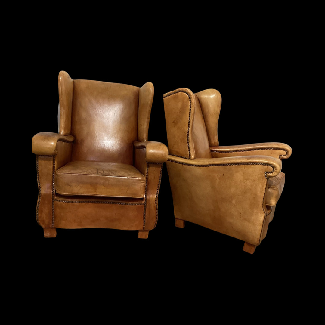 Pair of French Leather Arm Chairs